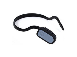 A picture of a headband that has a ear-shaped bend at the end of the left side to allow it to hang over the users ear. The right side has a small grey oval shaped device attached to it.