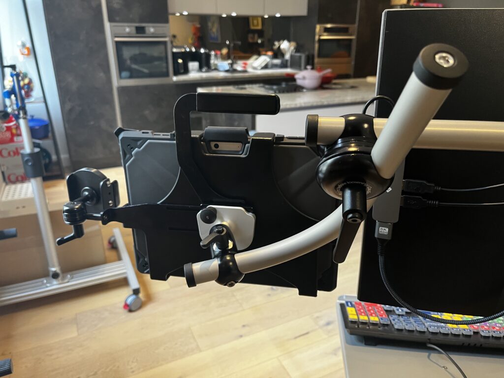 Rehadapt Microsoft surface Pro mount with side mounted phone hpolder and easy transfer handle.